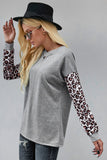 contrast leopard sleeve criss cross detail top