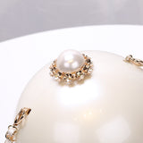 round pearl chain handbag