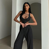 lace up bodysuit top and baggy wide leg pants