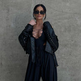 lace up bodysuit top and baggy wide leg pants