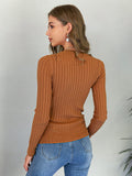 buttoned crewneck knit sweater