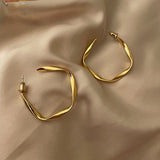 twisted c shaped earring