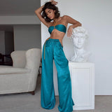 satin halter neck crop top and flared pants two piece sets